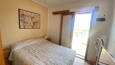 1802202614011_adosado-denia-las-rotas-dormitorio-principal.jpg