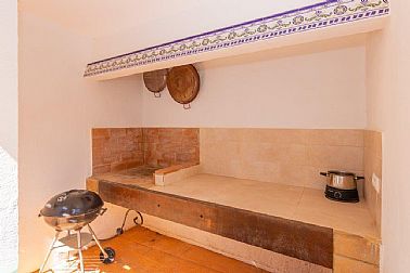 0108202610440_24-chalet-la-xara-denia-barbacoa-interior.jpg